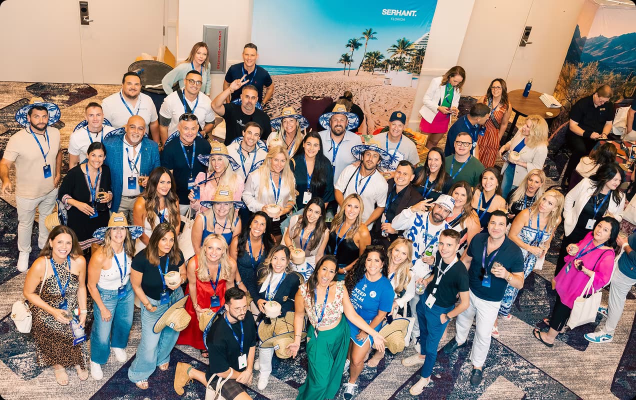 The SERHANT. Florida community group photo at Sell It ’25
