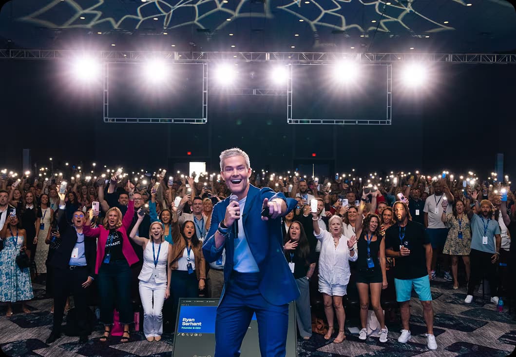 Ryan Serhant on stage with the crowd at Sell It ’25