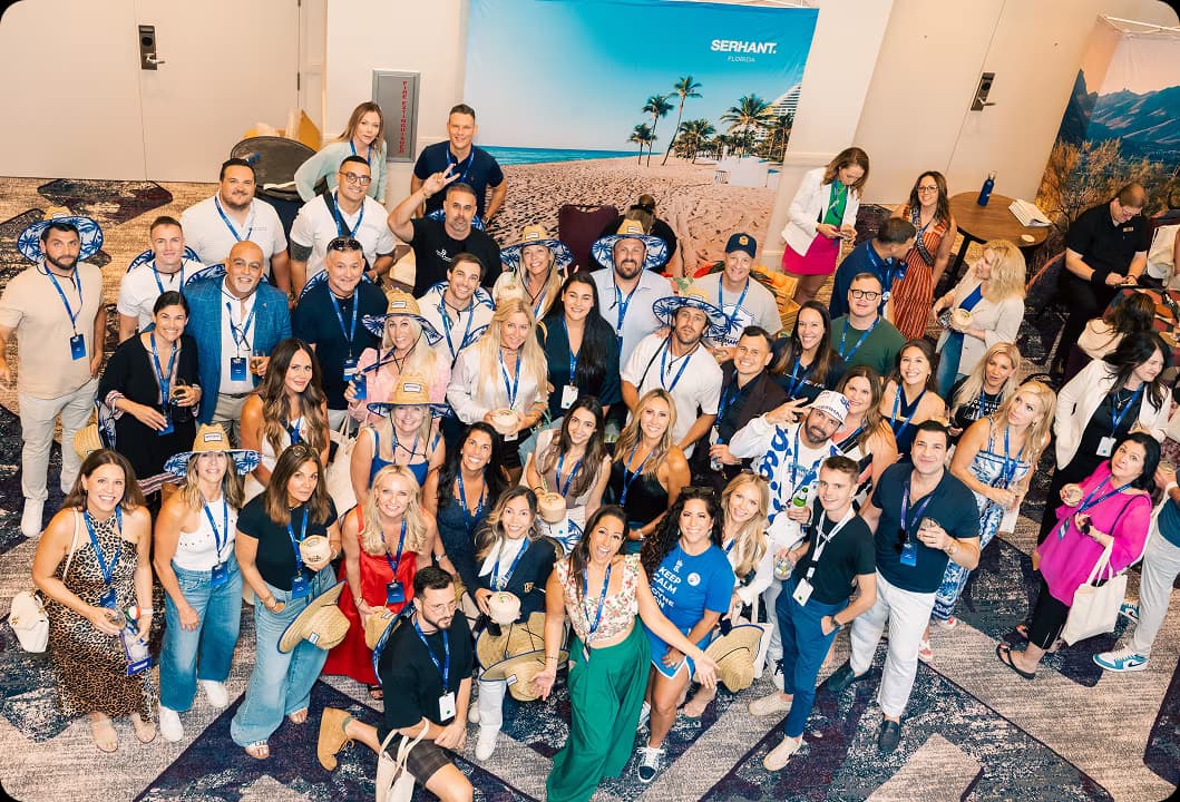 The SERHANT. Florida community group photo at Sell It ’25