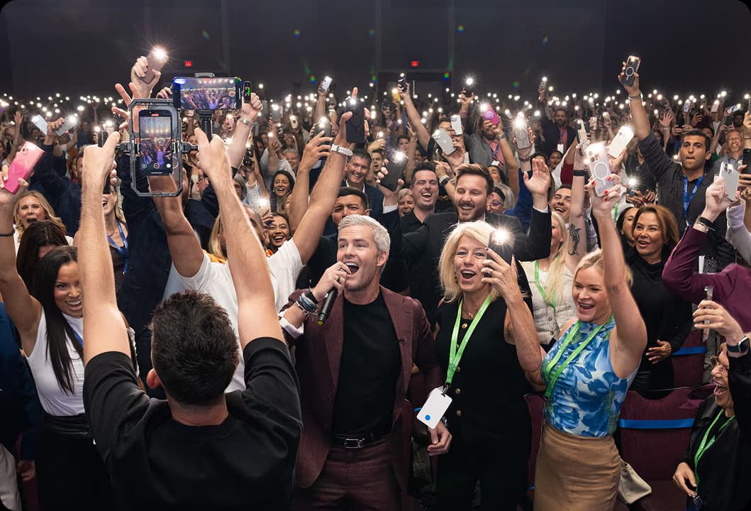 Ryan Serhant performing with the crowd at Sell It ’25
